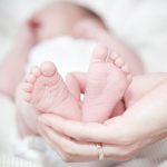 close-up-of-hands-holding-baby-feet-325690
